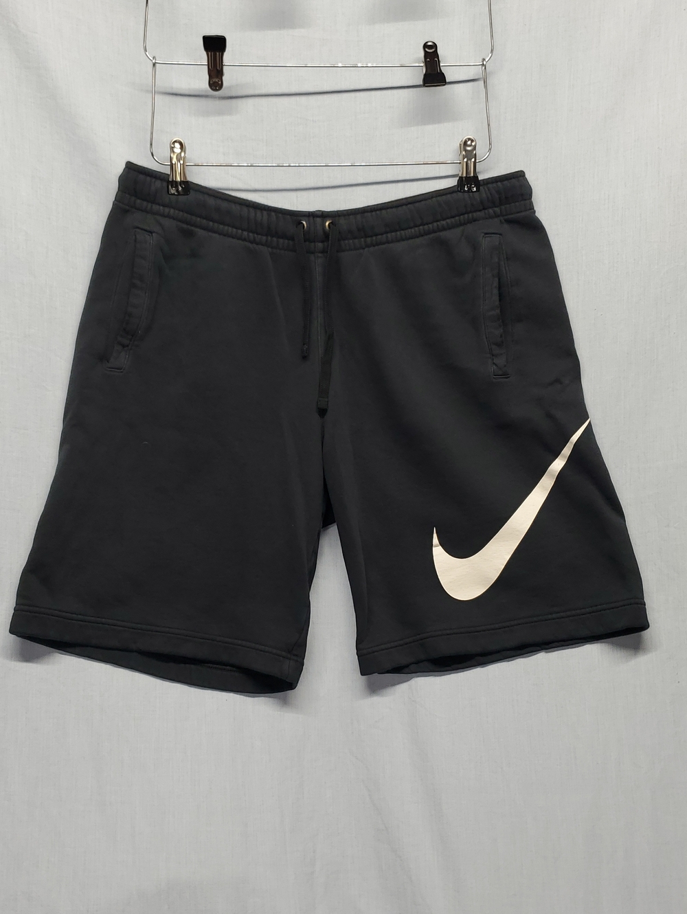 Nike Black Athletic Shorts with White Swoosh Accent